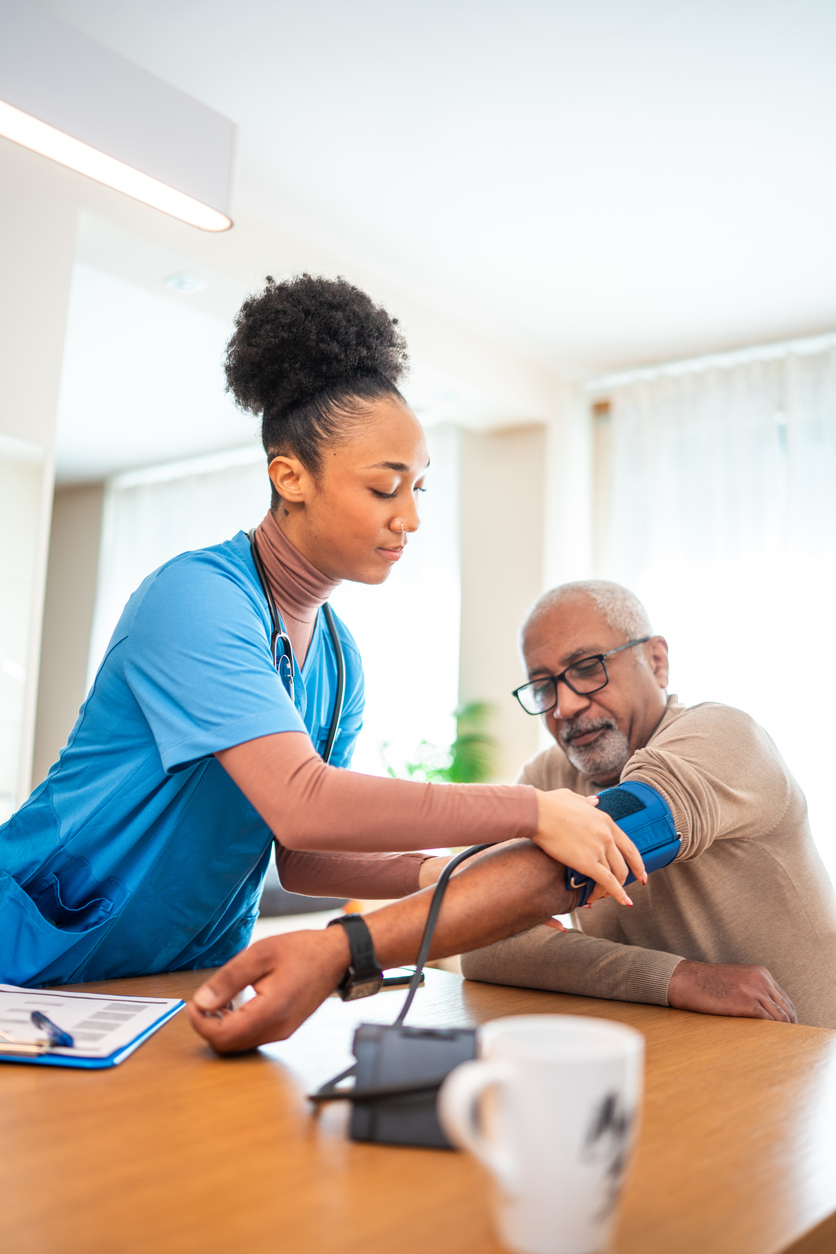 woman taking blood pressure